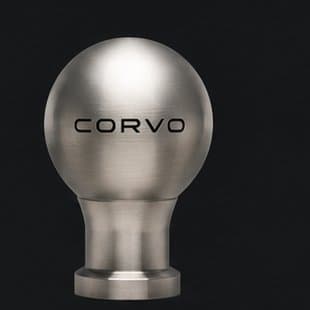 Concept render of the CORVO-001 shift knob in raw titanium; mark shown is not final